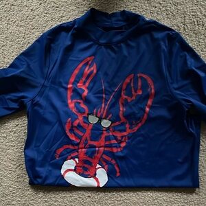 Size Large (kids) Lands End- swim shirt.  Short sleeves